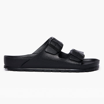 A black eva sandal with adjustable buckles and a flat sole.